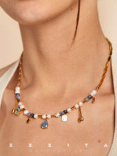 wearing Blue Current Pearl Necklace